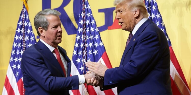 President Donald Trump and Ga. Gov. Brian Kemp shaking hands