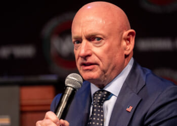 Mark Kelly speaks on a panel.