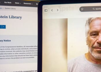 A close up image of a tablet screen displaying a portrait of Jeffrey Epstein beside the official U.S. Department of Justice website page on Feb. 11, 2026.
