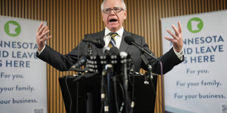 Tim Walz speaks during a press conference focused on Minnesota’s new paid family leave policy.