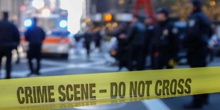 A crime scene with police tape.