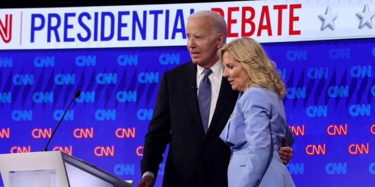 President Joe Biden embraces First Lady Jill Biden following the CNN Presidential Debate at the CNN Studios on June 27, 2024, in Atlanta, Georgia.