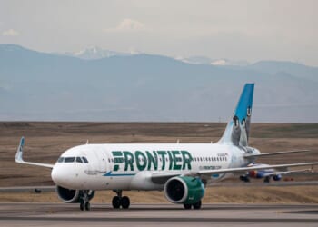 A Frontier Airlines Airbus A320neo plane, owned by the Bank of Utah Trustee, taxis to a gate at Denver International Airport on March 23, 2026, in Denver, Colorado.
