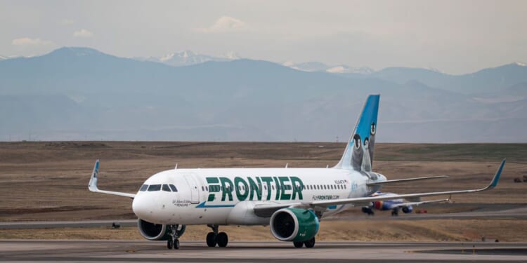 A Frontier Airlines Airbus A320neo plane, owned by the Bank of Utah Trustee, taxis to a gate at Denver International Airport on March 23, 2026, in Denver, Colorado.
