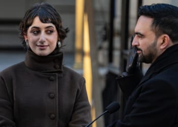 Zohran Mamdani is sworn in as New York City mayor as his wife Rama Duwaji looks on at City Hall on Jan. 1, 2026, in New York City.