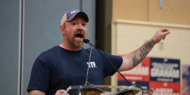 Democratic U.S. Senate candidate Graham Platner speaks during a town hall about a Vision for a Healthy Society on May 20, 2026, in Portland, Maine.