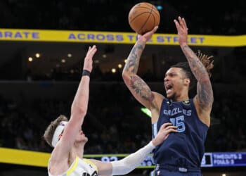 Brandon Clarke #15 of the Memphis Grizzlies takes a shot against Walker Kessler #24 of the Utah Jazz during the second half at FedExForum on March 12, 2025, in Memphis, Tennessee.
