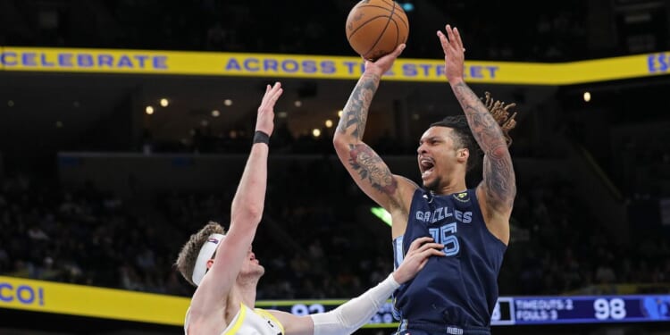 Brandon Clarke #15 of the Memphis Grizzlies takes a shot against Walker Kessler #24 of the Utah Jazz during the second half at FedExForum on March 12, 2025, in Memphis, Tennessee.