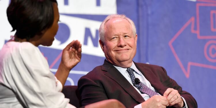 Joy-Ann Reid and Bill Kristol at a panel during Politicon at Pasadena Convention Center on July 29, 2017, in Pasadena, California.