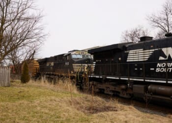 A Norfolk Southern train is en route on Feb. 14, 2023, in East Palestine, Ohio.