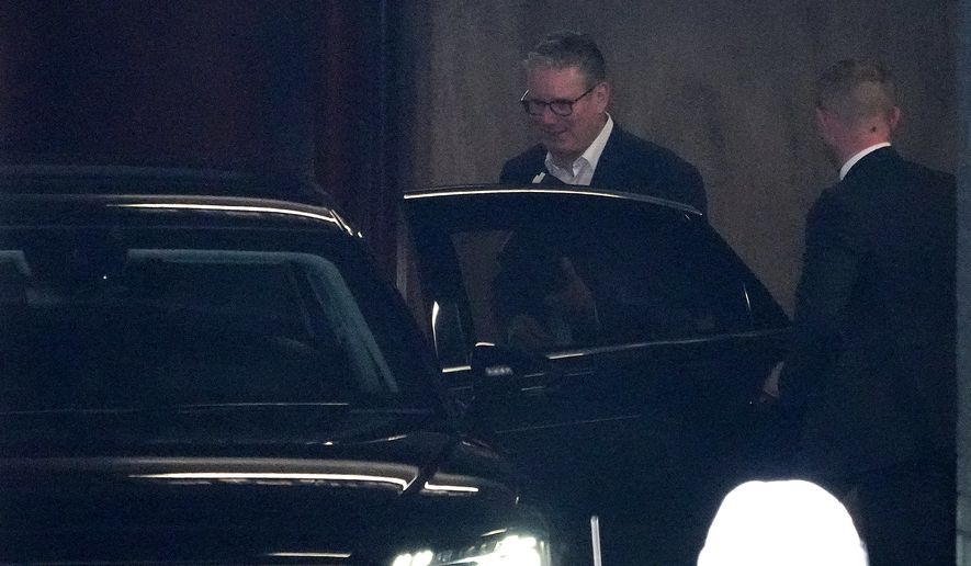 Britain's Prime Minister Keir Starmer enters his car to leave after delivering a speech at the Coin Street Neighbourhood Centre in Waterloo, London, Monday, May 11, 2026.(AP Photo/Kin Cheung)