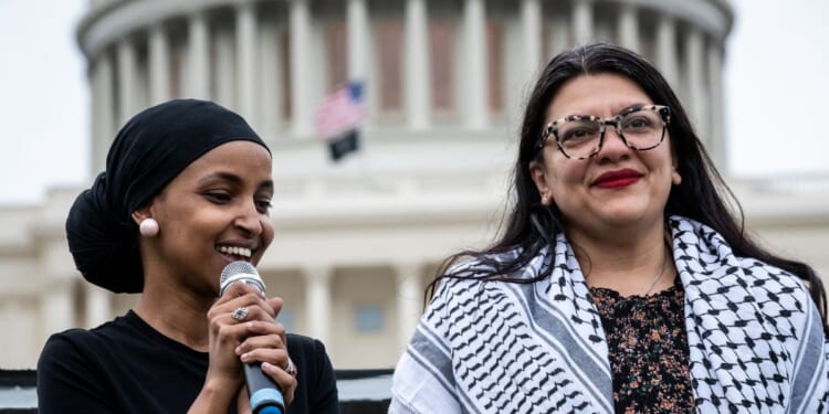 Rep. Ilhan Omar and Rep. Rashida Tlaib participate in a Passover Seder on the U.S. Capitol lawn hosted by Jewish organizations advocating a ceasefire in Gaza and Palestinian freedom, in Washington, D.C., on April 30, 2024.