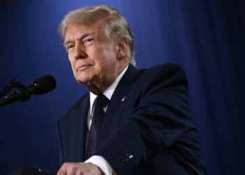 President Trump stands at a podium delivering a speech at the Rockford Community College in Suffern, New York on May 22, 2026.