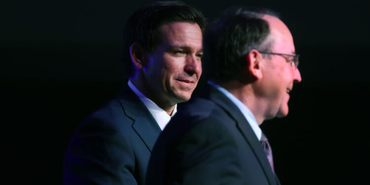 Florida Governor Ron DeSantis is introduced by U.S. Rep. Tom Tiffany at the Republican Party of Marathon County Lincoln Day Dinner.