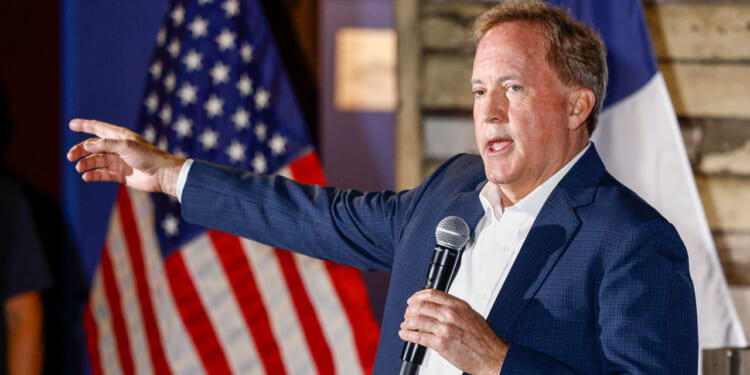 Texas Attorney General Ken Paxton, a Republican candidate for the U.S. Senate, speaks to attendees during a campaign rally May 19, 2026.