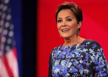 Kari Lake, President Donald Trump's choice to lead Voice of America, speaks at the Conservative Political Action Conference at the Gaylord National Resort Hotel And Convention Center on Feb. 21, 2025, in Oxon Hill, Maryland.