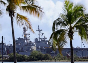 The USS Mahan, an Arleigh Burke-class guided-missile destroyer, is docked at the port of Ponce, Puerto Rico, with the USS Iwo Jima, a US Navy Wasp-class amphibious assault ship, in the background on Jan. 15, 2026.