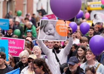 Pro-life campaigners take part in a march.