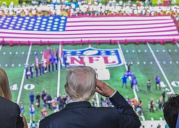 President Donald Trump salutes as the national anthem is played before the start of Super Bowl LIX between the Kansas City Chiefs and the Philadelphia Eagles at Caesars Superdome in New Orleans, Louisiana, on Feb. 9, 2025.