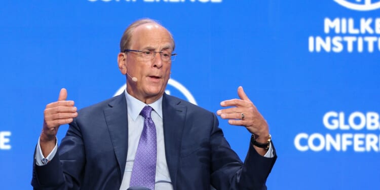 Laurence D. Fink speaking while seated
