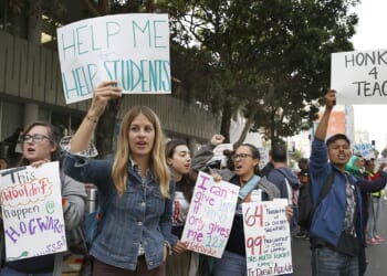 Teachers and supporters protesting