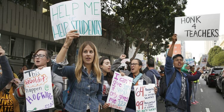 Teachers and supporters protesting