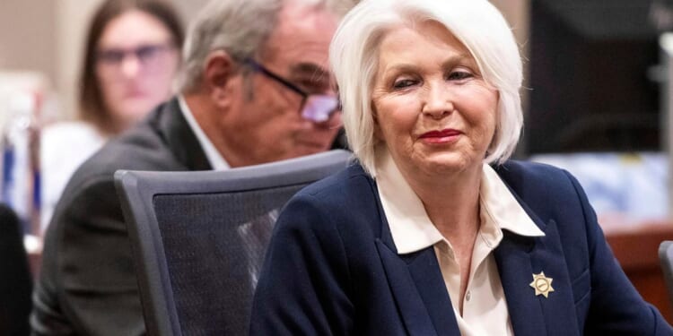 Colorado elections clerk released from prison after governor commutes sentence