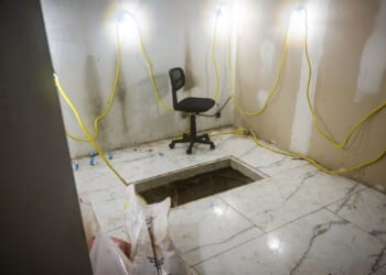 Four charged with smuggling cocaine via tunnel that connected fake San Diego storefront to Mexico