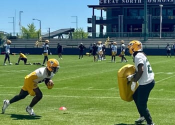 Josh Jacobs practicing with Packers while prosecutors weigh filing of charges