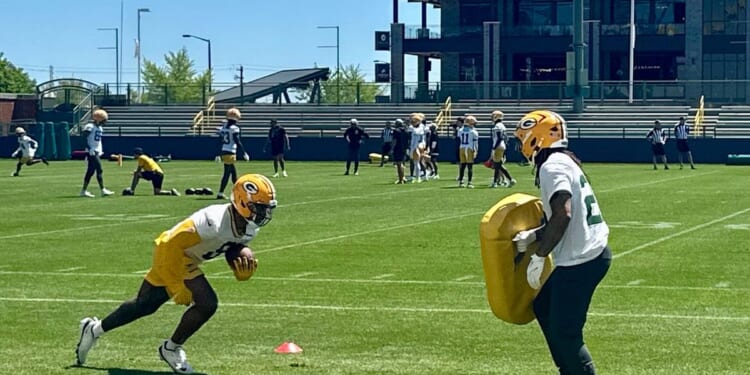 Josh Jacobs practicing with Packers while prosecutors weigh filing of charges
