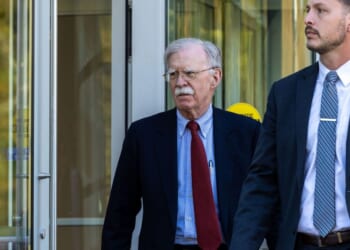 Former U.S. National Security Advisor John Bolton leaves federal court after pleading not guilty to charges of mishandling classified material on Oct. 17, 2025, in Greenbelt, Maryland.