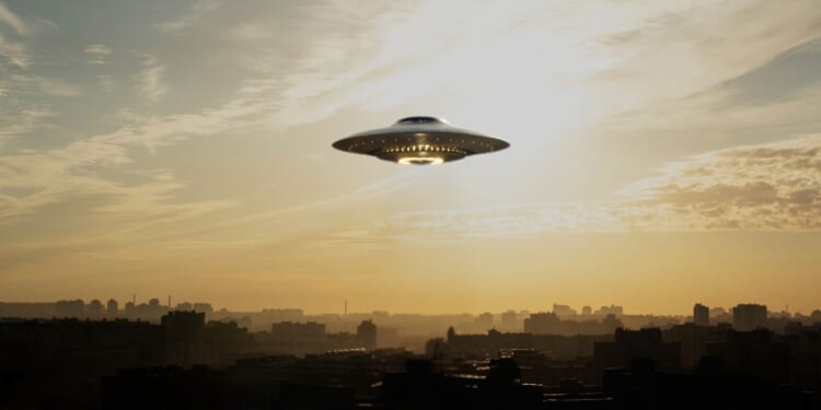 A strange flying machine in the shape of a saucer, silently hovering in the air. It emits a bright light and seems to scan the surrounding space with a beam.