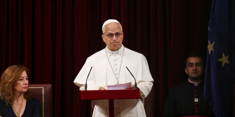 Pope’s historic speech to Spain’s parliament demands respect for migrants and gets 7-minute ovation