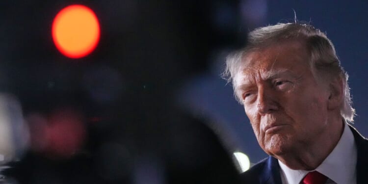 Trump vows to retaliate for downed U.S. chopper as Middle East turmoil imperils peace talks