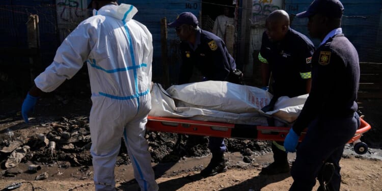 Mass shooting leaves 12 dead and at least 9 hurt in an impoverished South Africa community