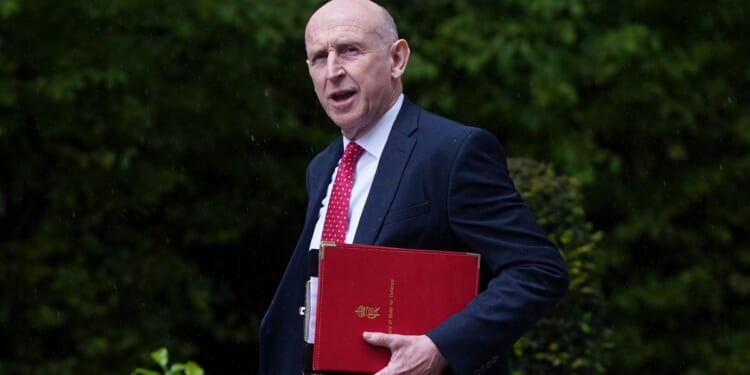 U.K. defense secretary quits, says government isn’t willing to spend enough on military