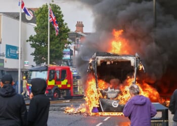 Belfast riots spread to second night as police deploy water cannons