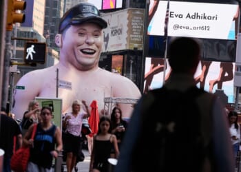 Elon Musk protest inflatable appears in Times Square ahead of SpaceX IPO