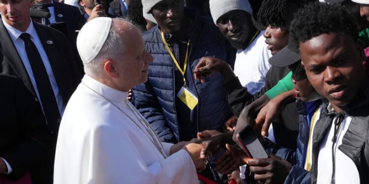 Pope is delayed in the Canary Islands when his charter flight has a technical problem