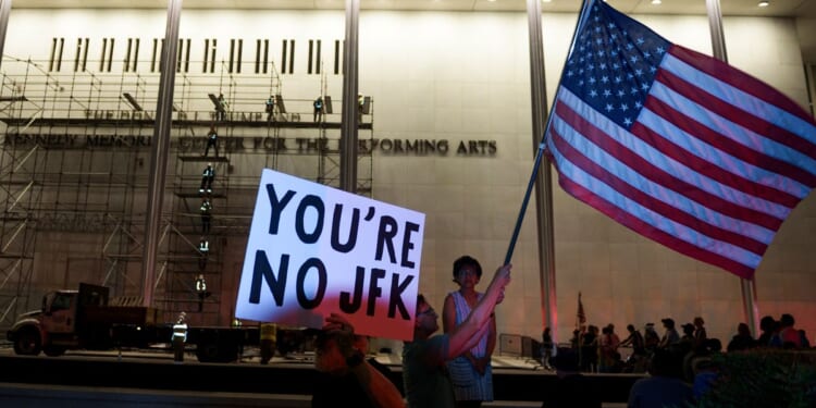 Workers begin removing Trump’s name from the Kennedy Center, hours after a court-ordered deadline