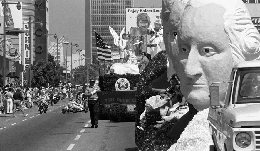 Floats and participants in the 10.8-mile All Nation, All People Official Los Angeles County Bicentennial Parade along Wilshire Boulevard in Los Angeles, Sunday, July 4, 1976. (AP Photo/File)