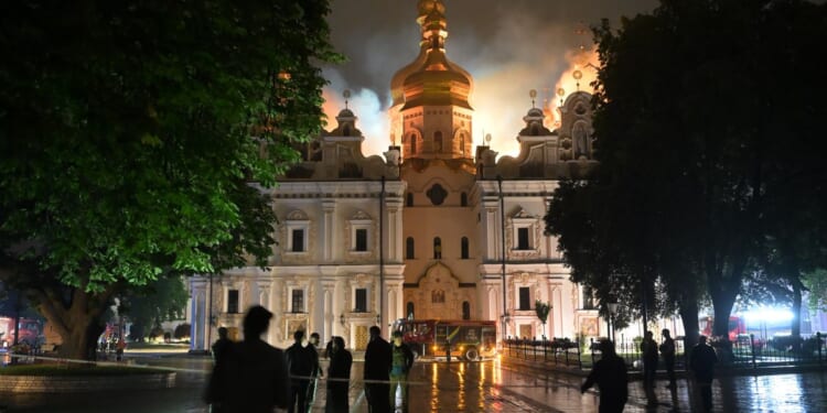 Attack sets fire to centuries-old religious site in Kyiv and kills 5 in Kharkiv