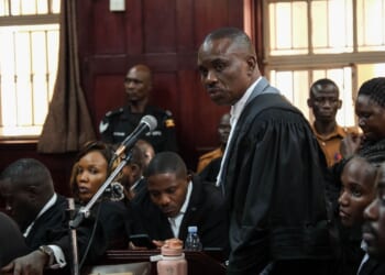 Uganda court charges lawyer for jailed Ugandan opposition leader with concealing treason