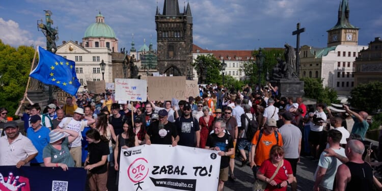 Thousands of Czechs rally against a government plan to overhaul the funding of public broadcasters