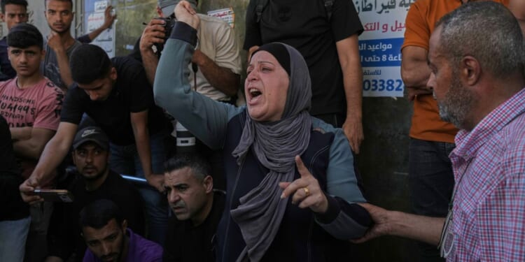 Teenage girl on the way to a high school in Gaza killed in Israeli strike, relatives say
