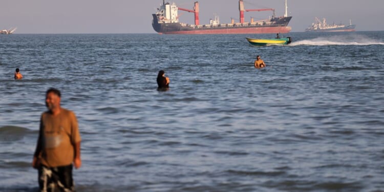 U.N. agency pauses evacuation of ships through the Strait of Hormuz after attack on vessel