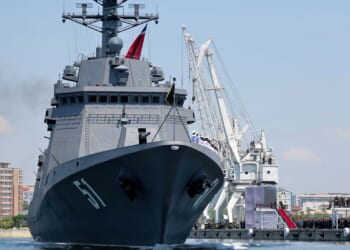 North Korea’s Kim claims progress on nuclear-armed navy as new warship is placed into service