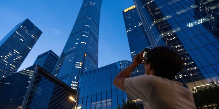 Small aircraft crashes into Beijing’s tallest building, according to flight tracking service