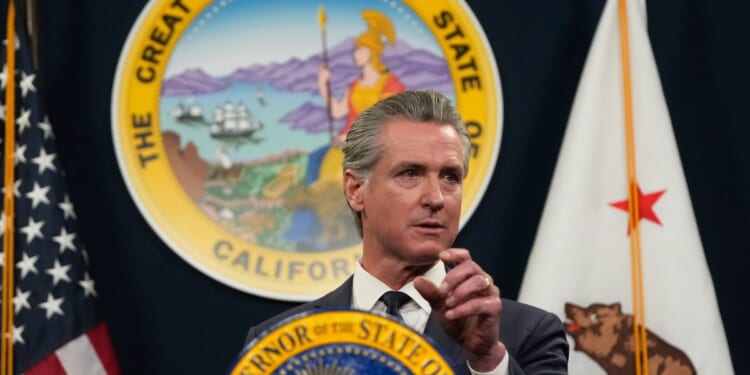 Democratic socialist surge pulls Newsom left — and fast