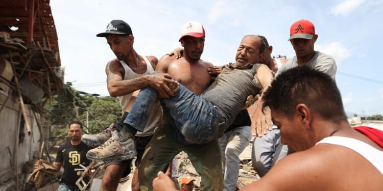Venezuelans take search for the missing into their own hands as earthquake death toll climbs